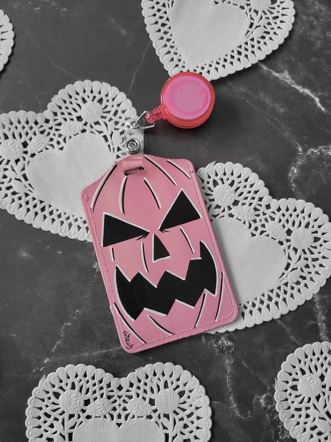 Pink Pumpkin painted retractable ID Tag By VOIDEaD