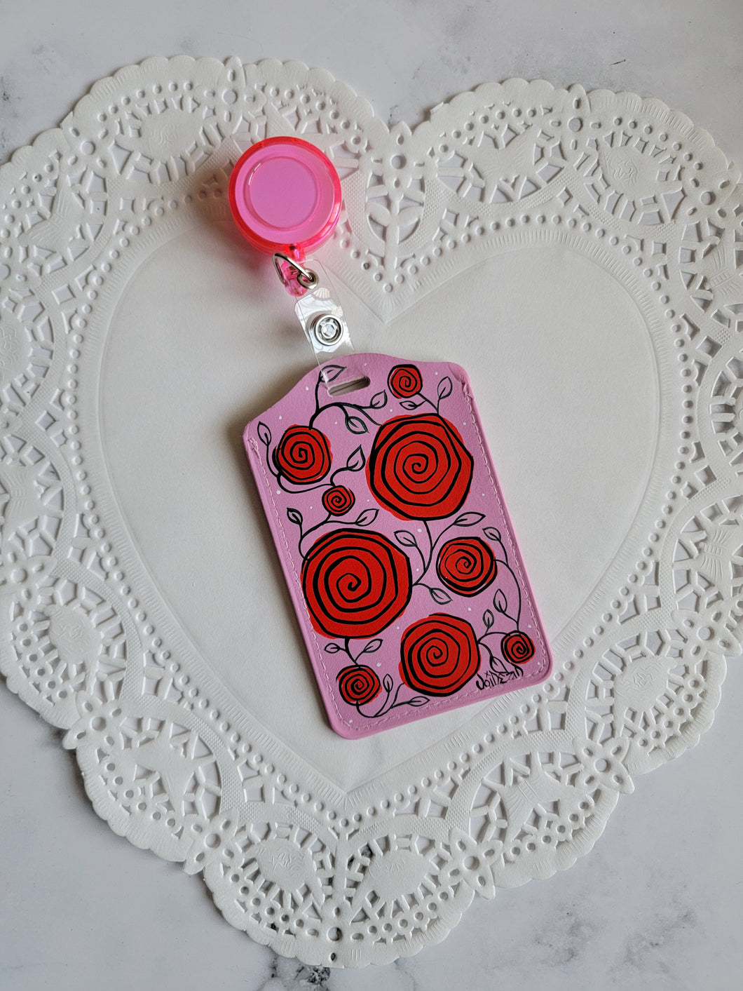 Pink roses painted retractable ID Tag By VOIDEaD