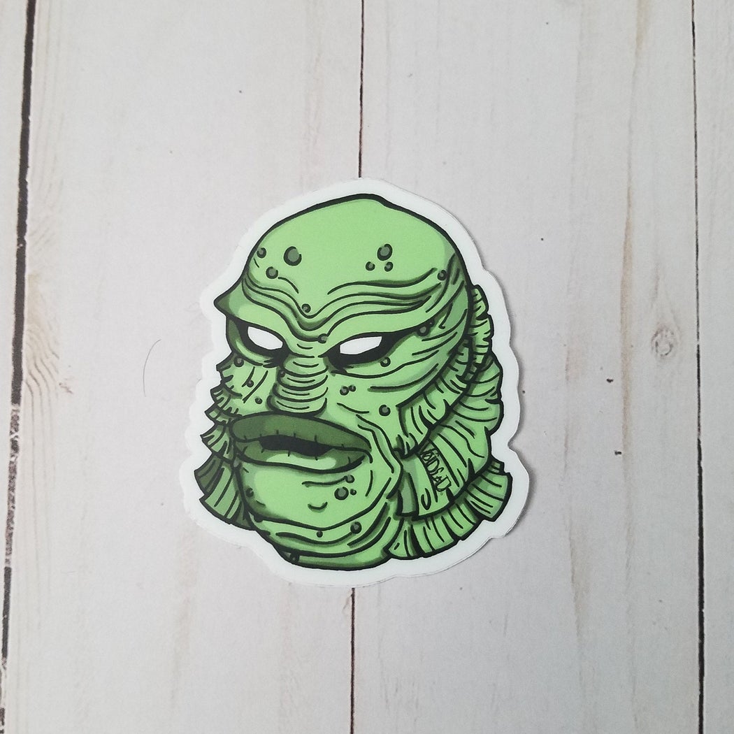 Green Lagoon Man Sticker By VOIDEaD